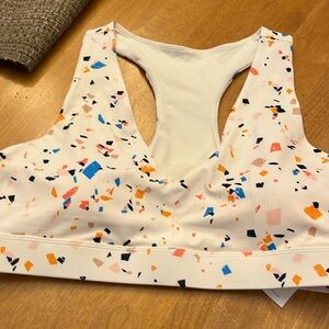 Fabletics cream speckled on the go sports bra